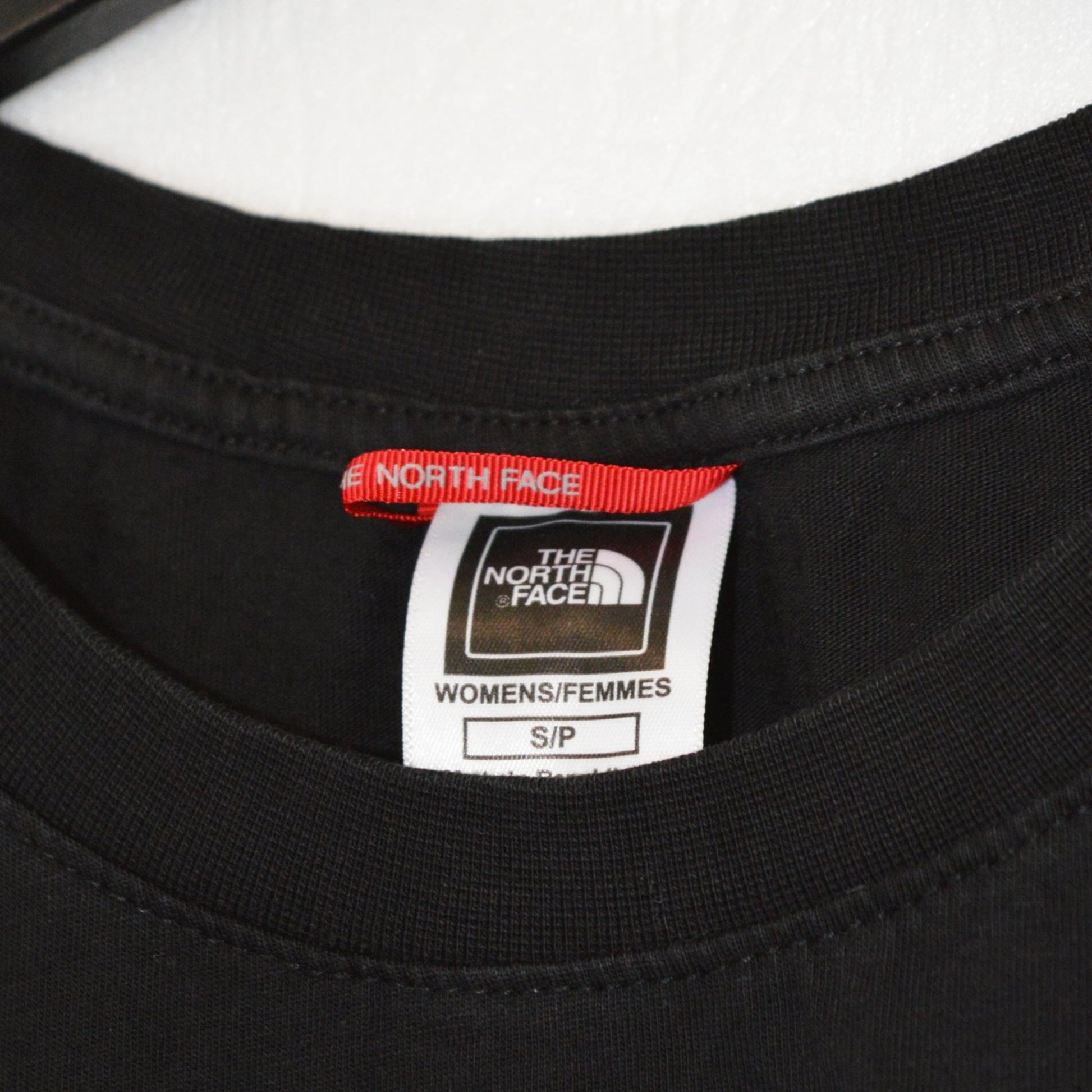 The North Face cropped тениска (S)